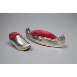 Two early 20th century novelty silver mounted pin cushions, canoe & clog, marks rubbed, canoe 9.