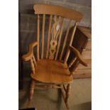 A pine and beech Windsor rocking chair