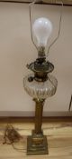 A Victorian brass stem oil lamp, height 58cm excl light fitting
