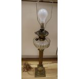 A Victorian brass stem oil lamp, height 58cm excl light fitting