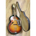 A 1950s possibly Isana semi-acoustic arch top guitar with a hard case. Floating pick-up not an