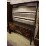 A 19th century oak dresser with open plate rack, width 152cm, depth 41cm, height 181cm