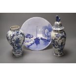 A delftware vase, 22cm, delft vase and a painted wall plate, 26cmCONDITION: 18th century vase -