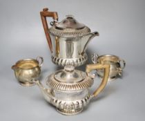 A silver milk jug and sugar bowl and a plated teapot and matching hot water jug, 12.5oz.