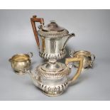 A silver milk jug and sugar bowl and a plated teapot and matching hot water jug, 12.5oz.