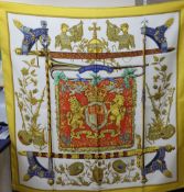 A Hermes 'The Queen's Silver Jubilee 1977' silk scarf together with another signed by C De Savigny