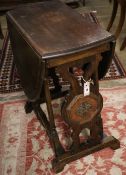 A 1930's oak gateleg table, width 72cm, height 75cm