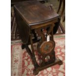 A 1930's oak gateleg table, width 72cm, height 75cm