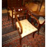 A set of eight Regency style mahogany dining chairs