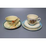 A Clarice Cliff Ravel pattern tea cup and saucer and a Queen Elizabeth II coronation trio,