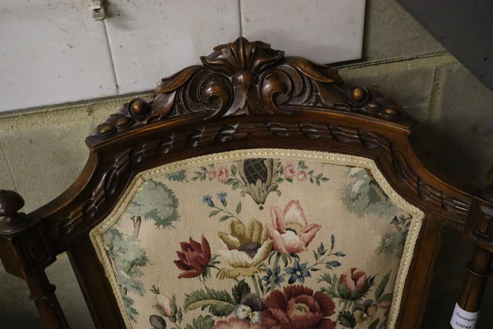 A late Victorian carved walnut upholstered open armchair - Image 2 of 3