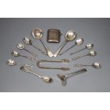 A George V silver vesta case and thirteen pieces of cutlery including eight silver.