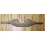 A 19th century carved wood dairy yoke