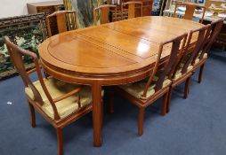 A Chinese hardwood dining table, 234cm extended (three spare leaves), width 112cm, height 76cm and