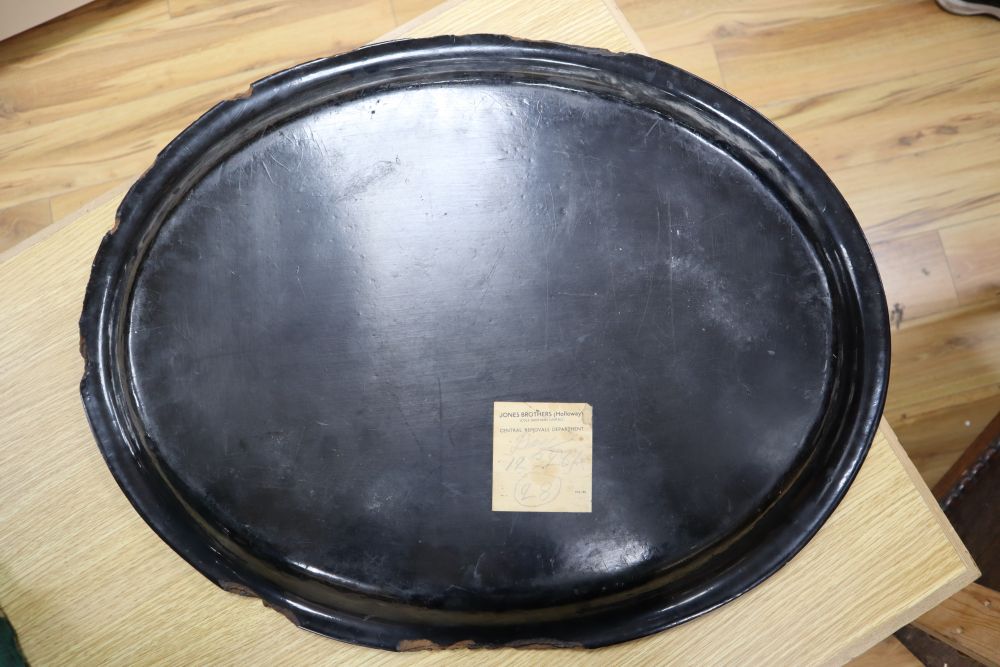 A Victorian oval papier mache tray, width 64cmCONDITION: Some chips around edge, clearly visible; - Image 2 of 2
