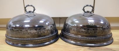 A pair of Victorian silver plated meat domes