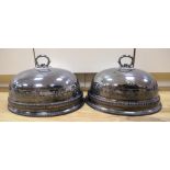 A pair of Victorian silver plated meat domes