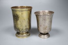 An 18th century French white metal beaker, 94mm and a later gilt white metal French beaker, 11.