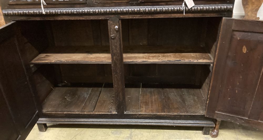 A late 18th century carved oak court cupboard, width 130cm, depth 52cm, height 170cm - Image 4 of 5