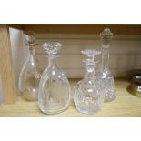 A silver Jubilee 1977 commemorative etched decanter and stopper and three other glass decanters,