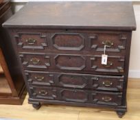 An early 18th century oak chest with hinged top, width 84cm, depth 45cm, height 85cm