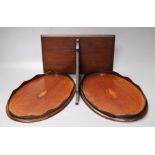 A pair of small inlaid oval mahogany trays, 31cm and a Chippendale style mahogany wall bracket, 27cm