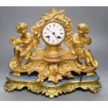 A 19th century French ormolu and gilt metal mantel clock, with musical youth surmount, Vincenti bell