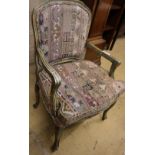 A French painted upholstered open armchair