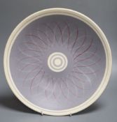 A Poole Pottery wall plate, initialled verso PRP, 33cmCONDITION: Good condition