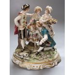 A German porcelain group, height 18cmCONDITION: Both ladies heads have been off and reglued. Several