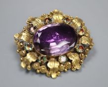 A Victorian yellow metal, foil backed amethyst and white paste set oval brooch, 34mm, gross 9.2