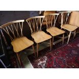 Four Ercol dining chairs