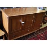 An Ercol sideboard, width 114cm, depth 50cm, height 81cm