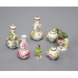Meissen miniature porcelain - two pairs of flower encrusted vases and covers, a pink floral vase and