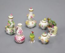 Meissen miniature porcelain - two pairs of flower encrusted vases and covers, a pink floral vase and