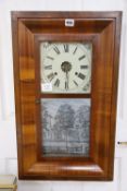 A mid 19th century American wall clock by Seth Thomas, Plymouth Hollow, Connecticut, in walnut