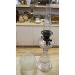 An Edwardian cut glass oil lamp