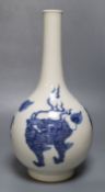 A Chinese porcelain blue and white bottle vase, painted with dragons in underglaze blueCONDITION: