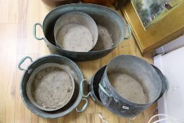 Two Victorian copper two handled fish kettles & two circular preserve pans, one stamped Jones