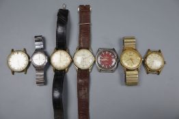 Seven assorted wrist watches, including Avia and Roamer.