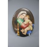 A Paris porcelain plaque of Raphael's Madonna and Child, height 12cm