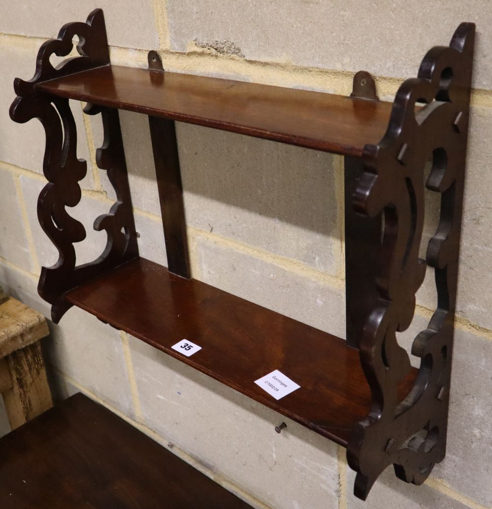 A Victorian mahogany two tier wall bracket, width 52cm depth 17cm height 46cm