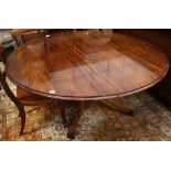 A Regency style mahogany circular tilt top breakfast table, 148cm diameter, height 69cm