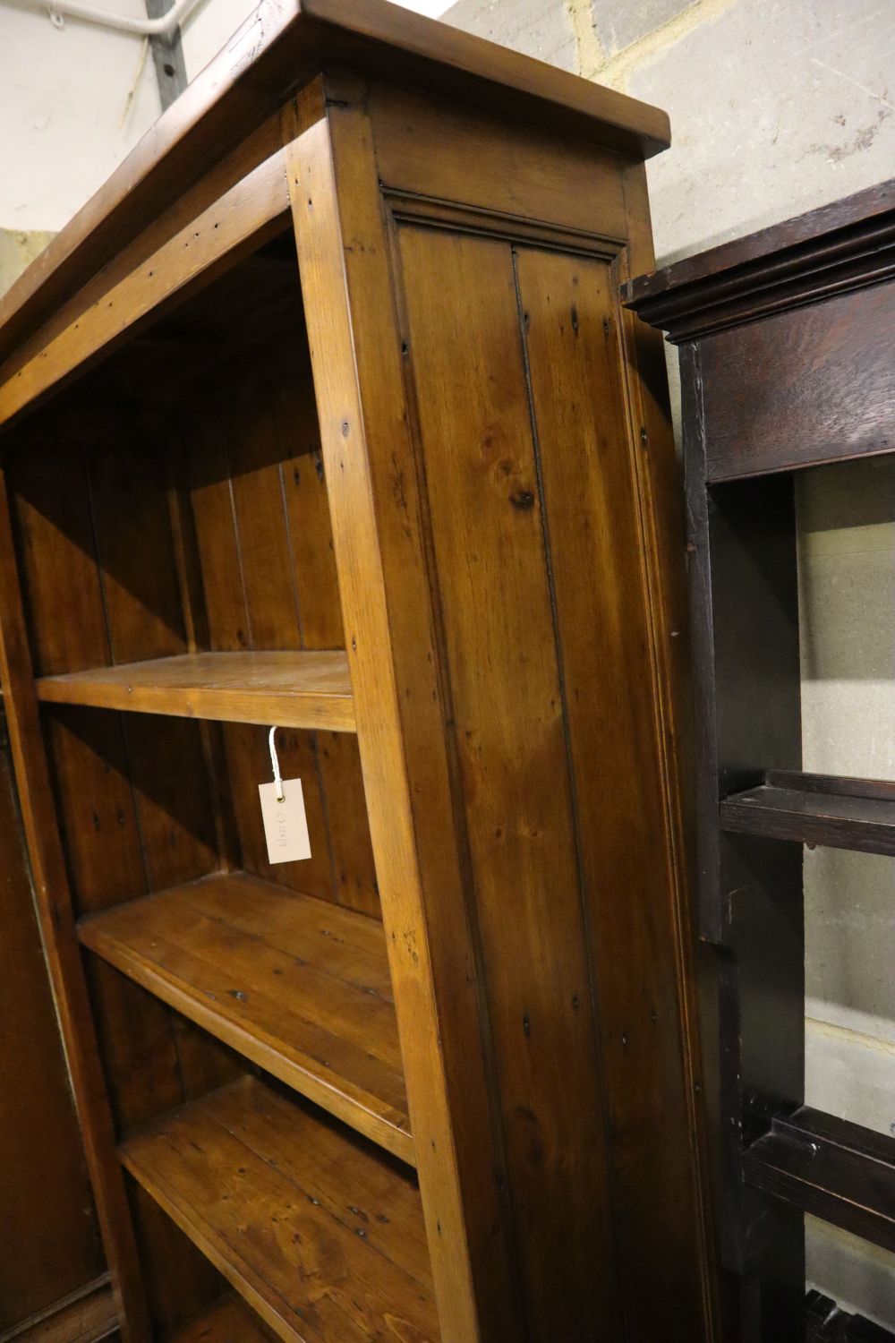 A modern stained pine open shelved bookcase, width 98cm depth 33cm height 198cm - Image 2 of 3