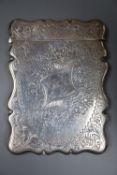 An Edwardian engraved silver card case, Birmingham, 1909, 94mm.CONDITION: Small bump to one corner