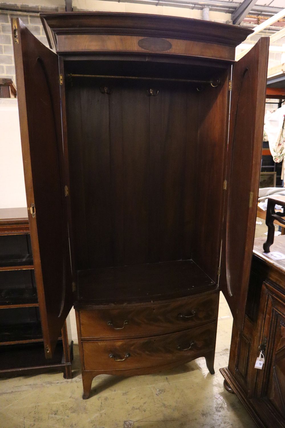 A 1920's George III style mahogany bow front wardrobe with two drawers, with key, width 102cm - Image 3 of 3