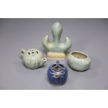 Three Chinese celadon miniature ornaments and a blue glazed teapot, largest 10cm