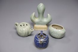 Three Chinese celadon miniature ornaments and a blue glazed teapot, largest 10cm