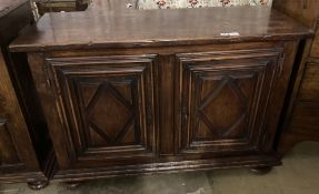 A mid 18th century French provincial oak and elm two door cupboard, with fruitwood top, width 129cm,