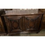 A mid 18th century French provincial oak and elm two door cupboard, with fruitwood top, width 129cm,
